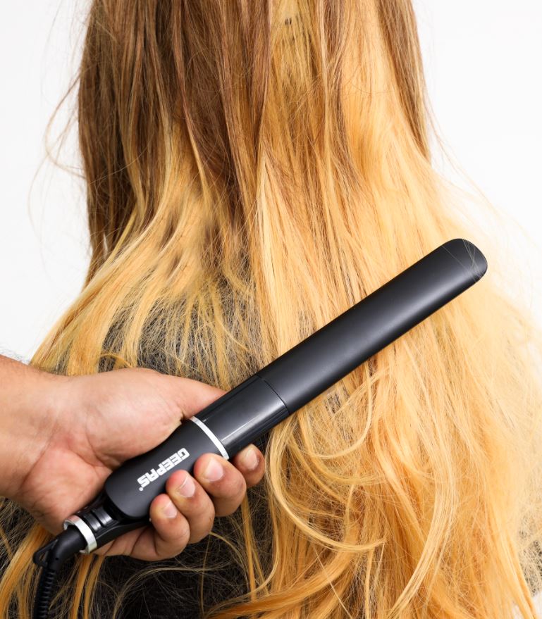 مكواة فرد الشعر الرقمية